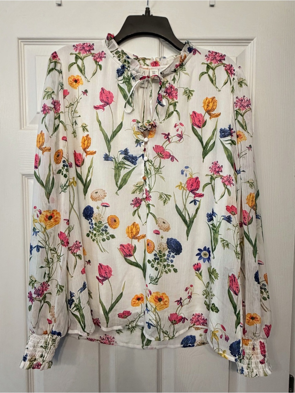 Joie white floral botanical print with smocked cuffs and tie neck detail
